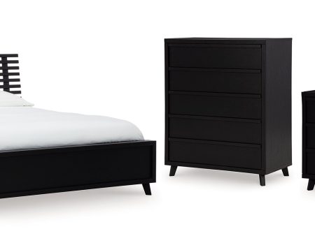 Danziar Queen Panel Bed with Mirrored Dresser and Chest in Black Supply